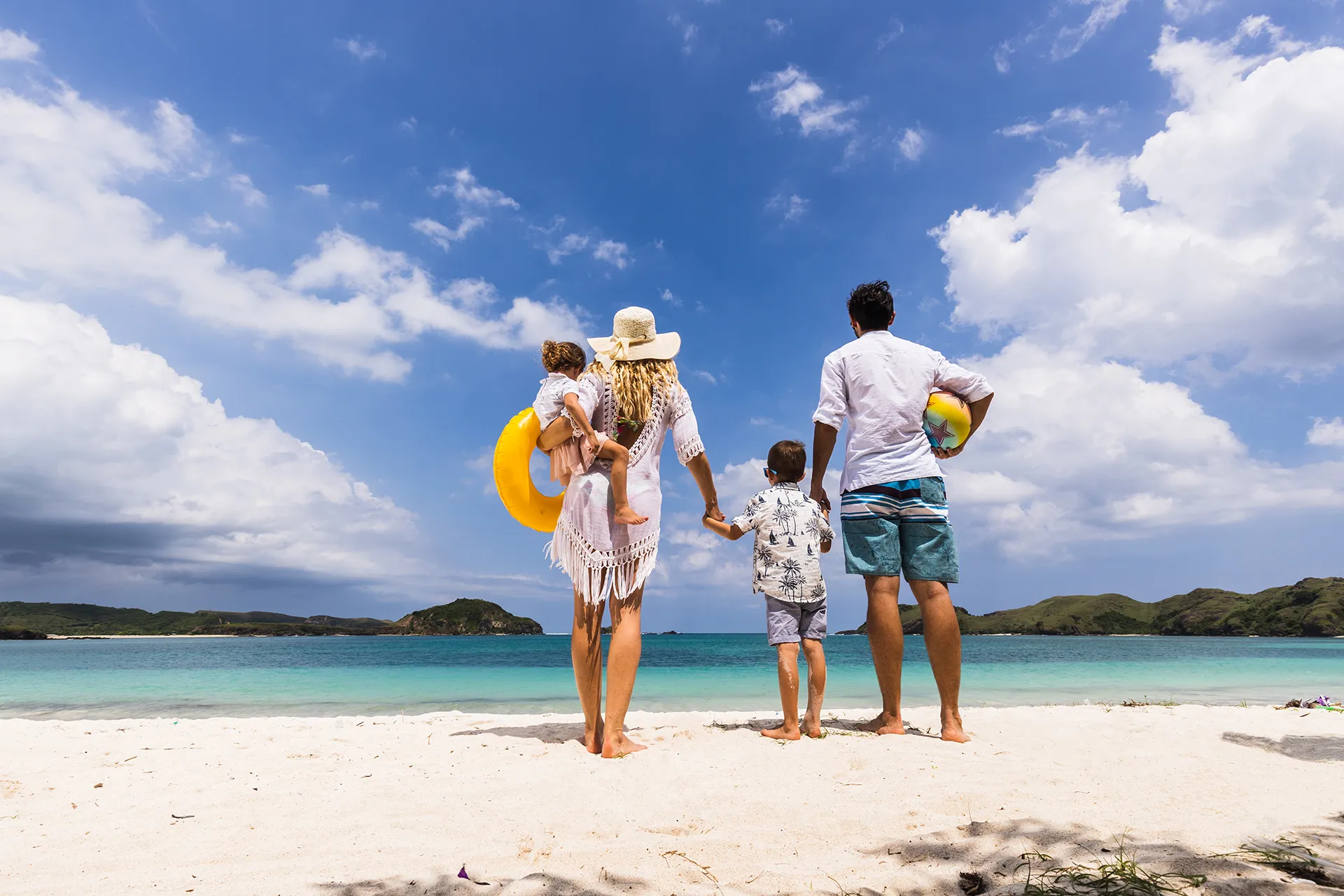 Family enjoying a leisure trip on the beach